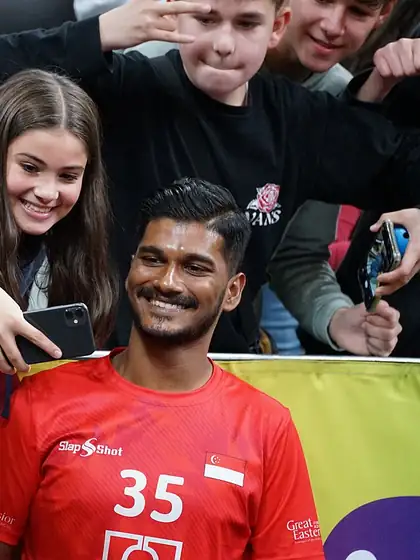 Fans celebrating and taking a selfie