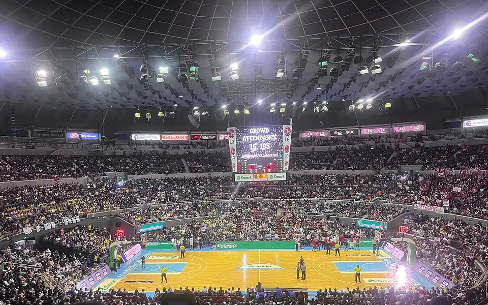Packed arena crowd watching a PBA Philippine Cup finals game in Manila